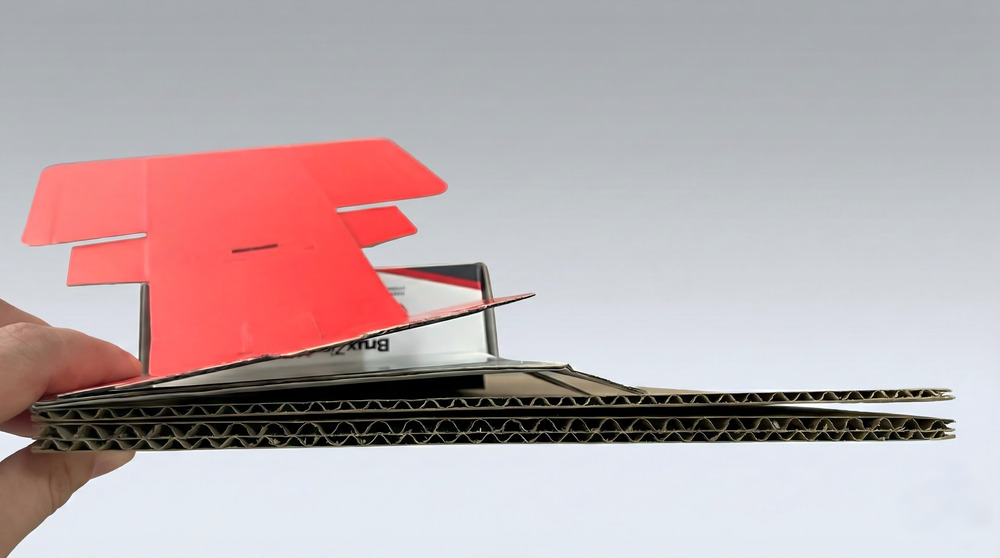 Comparison of corrugated flute types including F flute, E flute, B flute, and double-wall board showing thickness differences