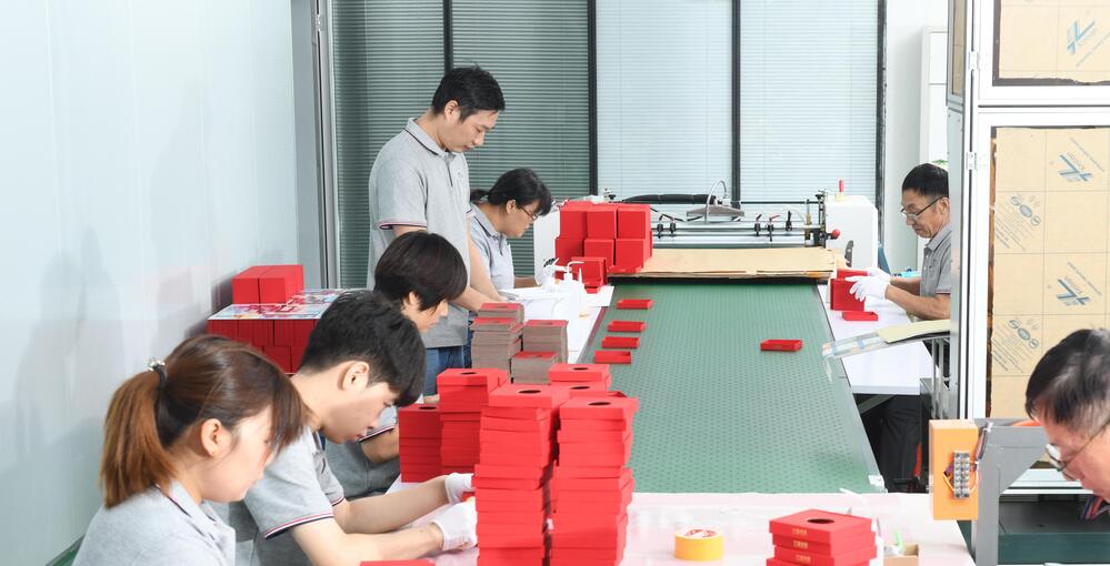 Packaging design affecting packing and assembly efficiency in real production