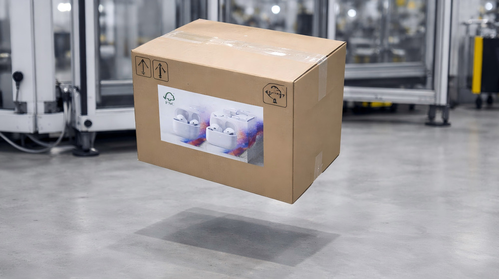 Corrugated shipping carton undergoing drop test